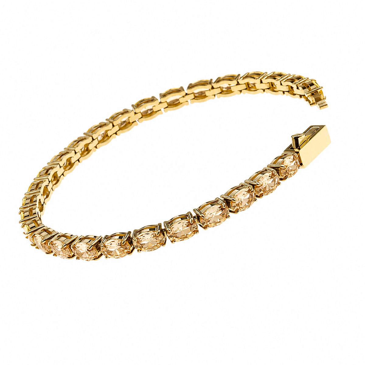 A gold tennis bracelet featuring a row of oval-cut champagne gemstones in a prong setting, displayed on a clean white background.