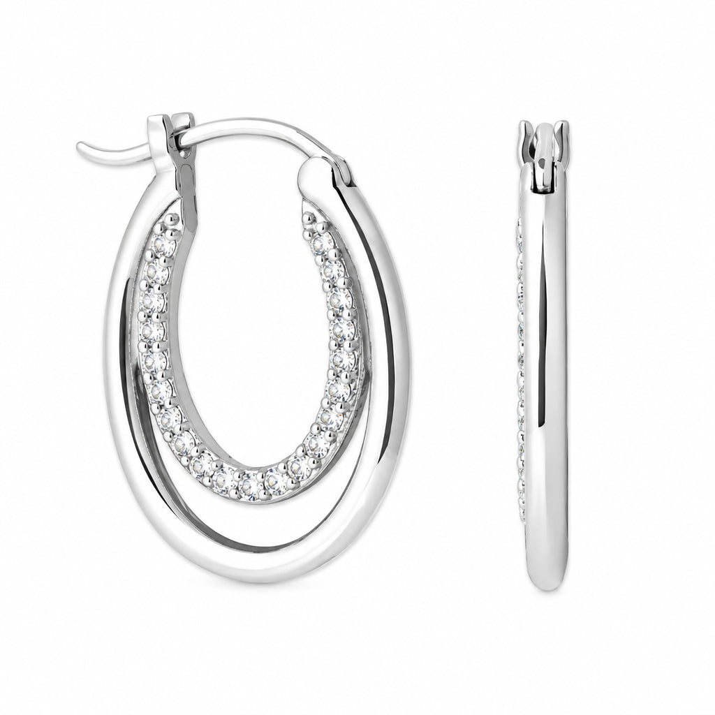 Silver hoop earrings with embedded stones on a white background