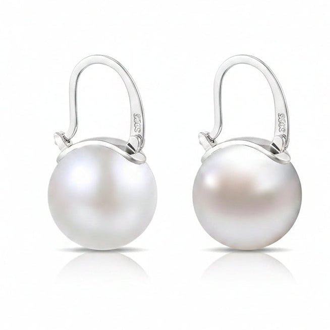 Edison Pearl earrings with silver hooks on a white background