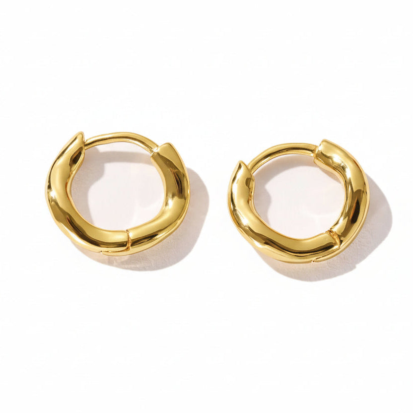Irregular Shaped Huggies earrings, 925 Sterling Silver, 14k Gold-Plated, light gold color, Rhodium Plated finish.