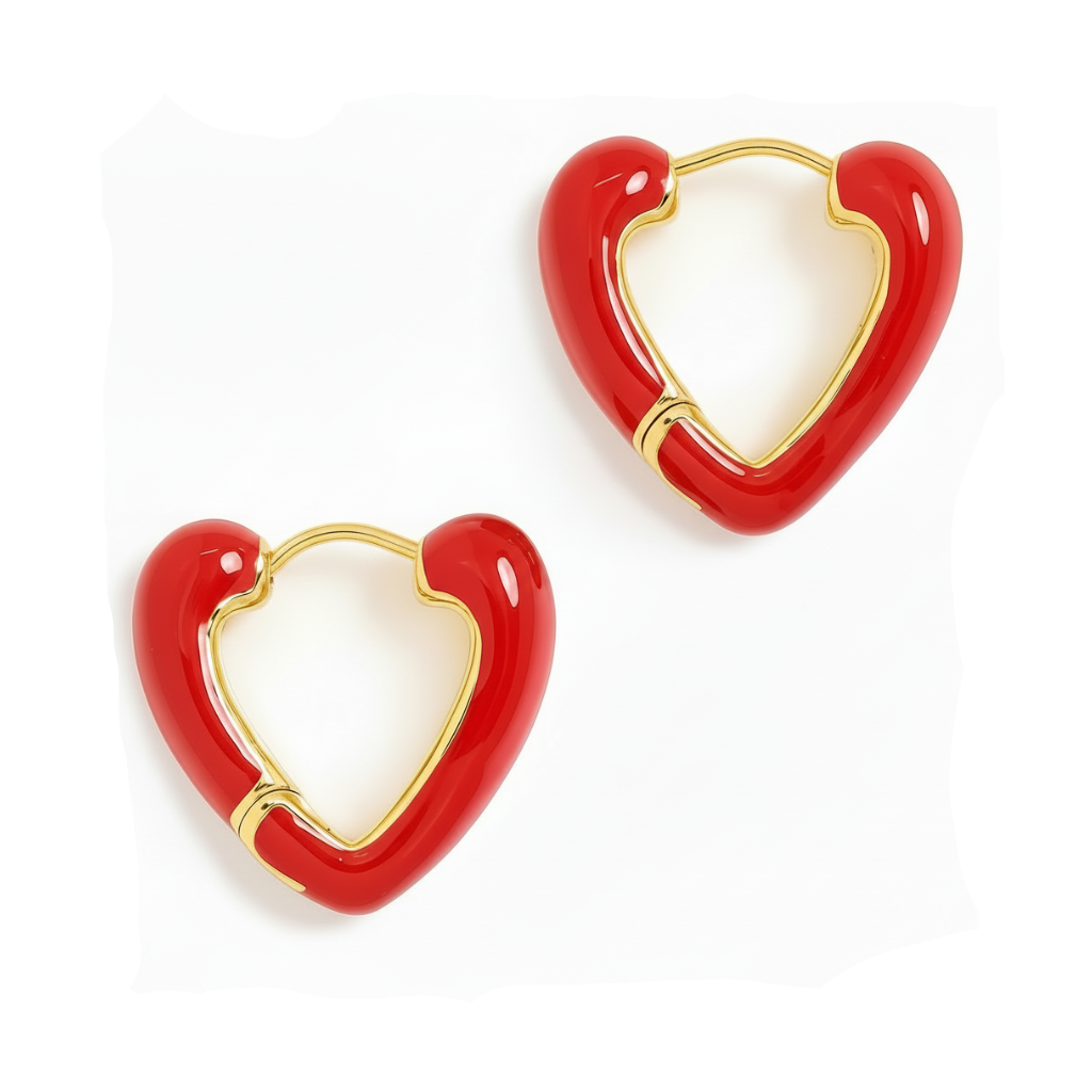Red heart-shaped earrings with gold accents on a white background