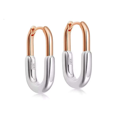 Two-tone earrings featuring sterling silver and 14k gold plating, rhodium finished for a stylish, modern look.