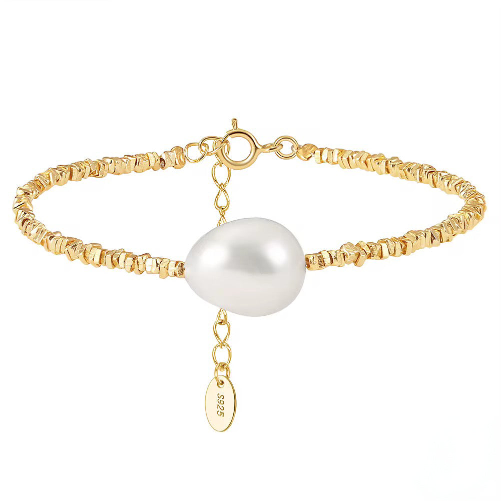 A pearl with silver beads
