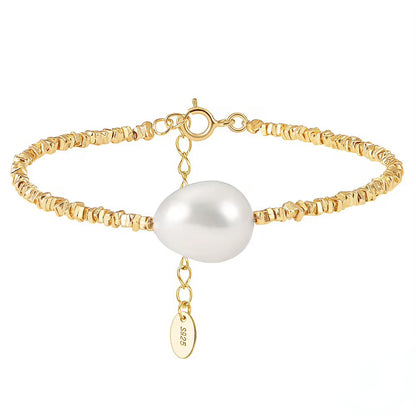 A pearl with silver beads