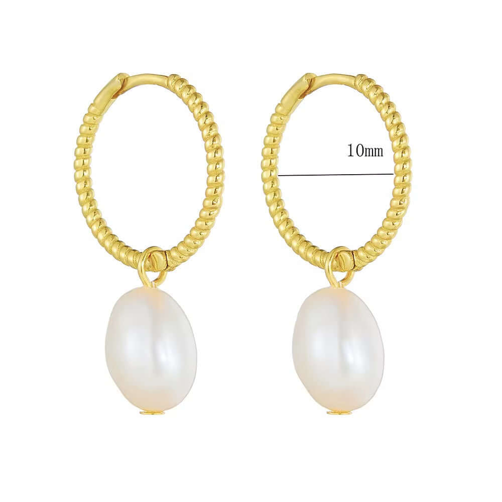 Elegant 925 Sterling Silver and 14k Gold-Plated Pearl Huggies with Rhodium finish, perfect for any occasion.