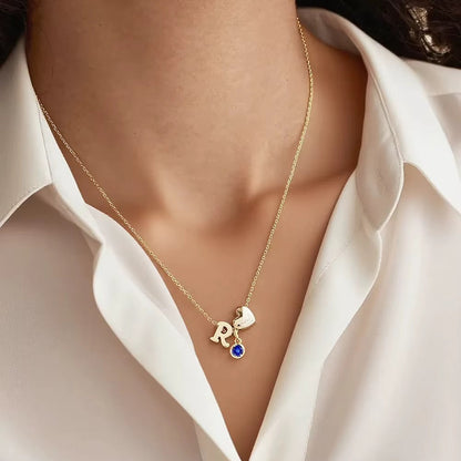 gold M red birthstone heart initial necklace