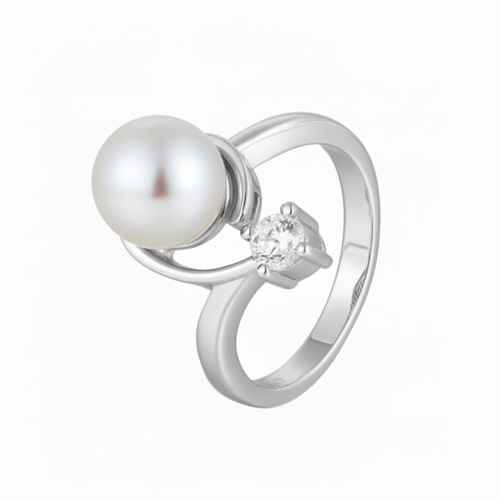 Silver ring with a pearl and small diamond on a white background