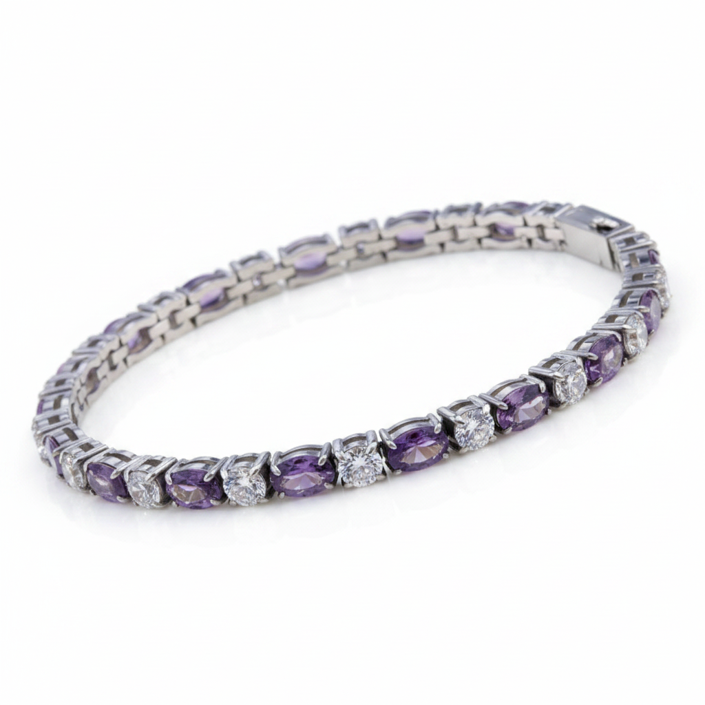 A tennis bracelet featuring oval light purple amethyst stones and round clear cubic zirconia accents, set in a silver-tone metal, shown on a plain white background.