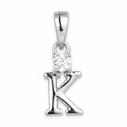 A sterling silver initial pendant charm shaped like the letter 'K', featuring a small clear round-cut gemstone at the top, set against a plain white background.